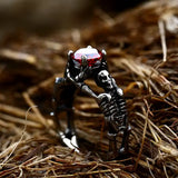 Skeleton Ring with Red Zirconium